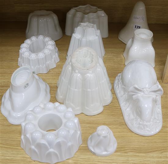 Eleven porcelain jelly moulds